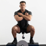 Flywheel strength training machine for eccentric overload, sprint power, and explosive athletic performance