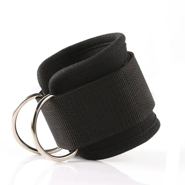 Black padded nylon cuff with a wide adjustable strap and two silver metal O-rings, photographed on a white background.