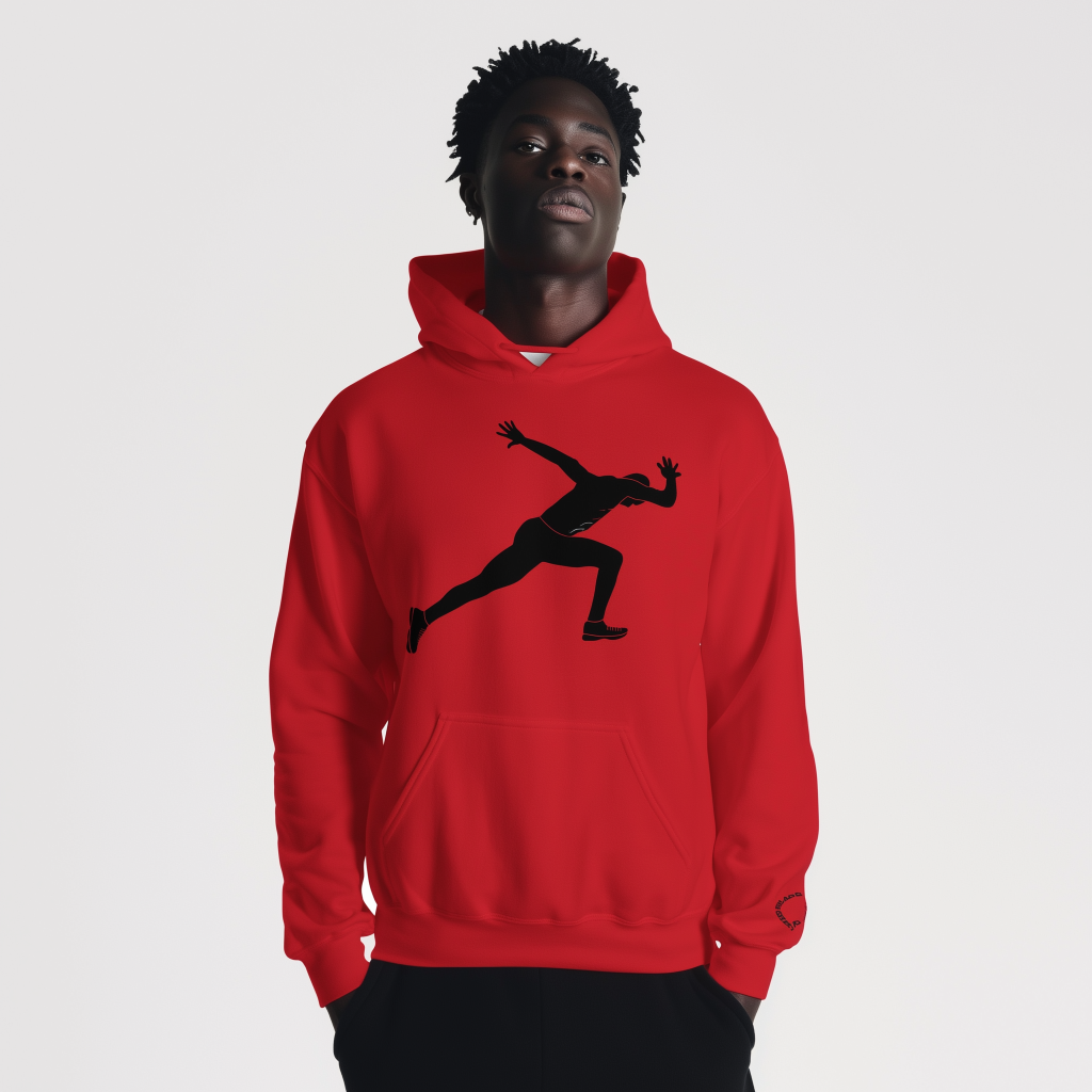Person with short twisted hair wearing a bright red hoodie printed with a large black silhouette of a runner, standing with hands in pockets against a plain white background while gazing slightly upward.